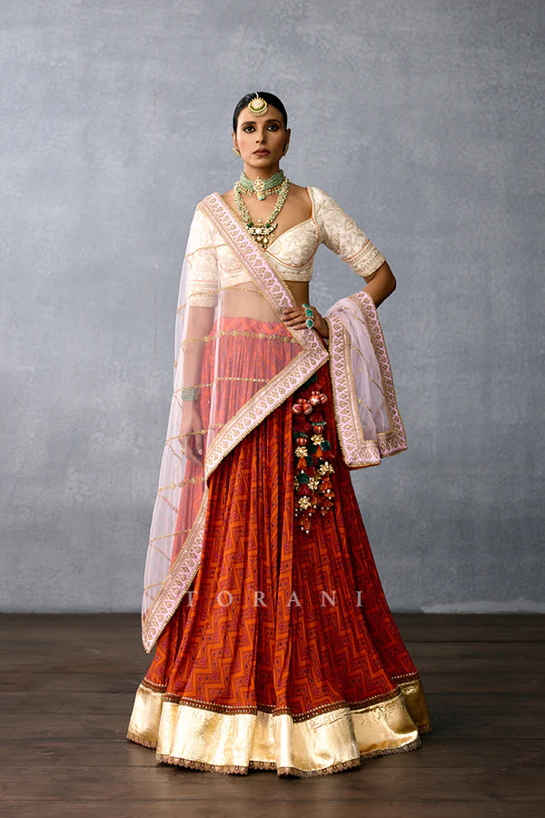 Torani’s Gerua Maniki Lehenga